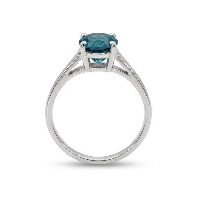 Bague or blanc et topaze taille brillant