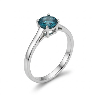 Bague or blanc et topaze taille brillant