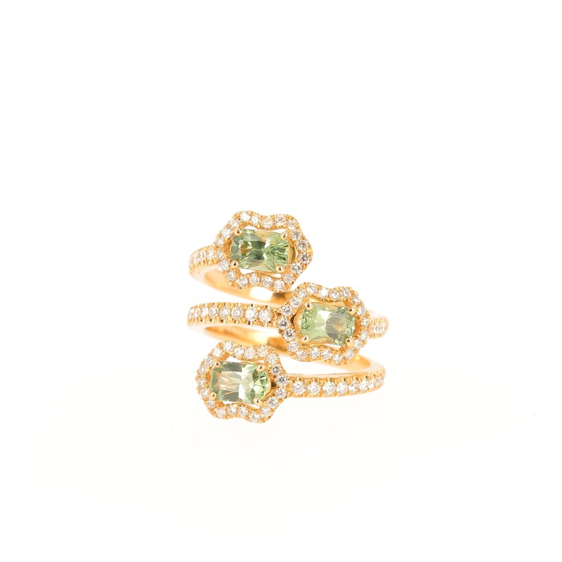Triple rose gold ring set with three green sapphires and diamonds
