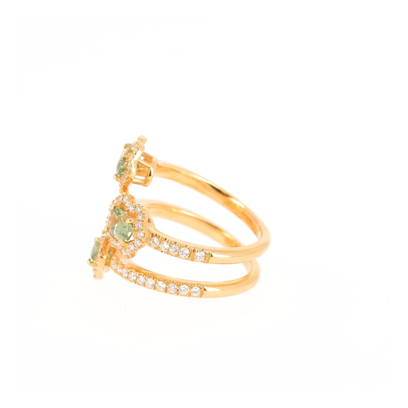 Triple rose gold ring set with three green sapphires and diamonds