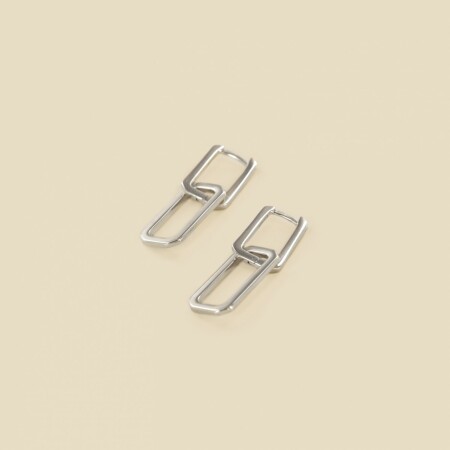 Les boucles d'oreilles argent Karm