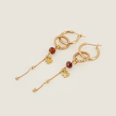 Les boucles d'oreilles Lilie brunes