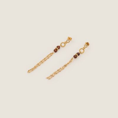 Les boucles d'oreilles Flores brunes