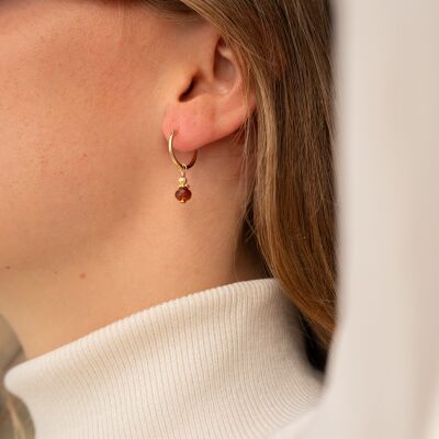 Les boucles d'oreilles plaquées or Ambre brunes
