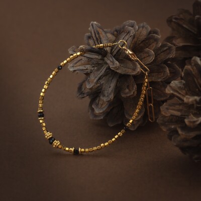 Le bracelet pierres naturelles Bima noir et doré