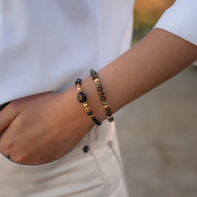 Le bracelet en pierres marron et plaqué or Diosa