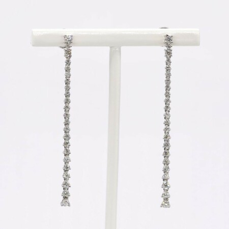 Boucles d\'oreilles pendantes Longinus or blanc et diamants