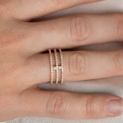 Bague en or rose trois anneaux et diamants