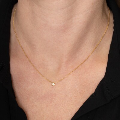 Pendentif sur chaine solitaire or jaune, diamant taille brillant 0.10ct serti clos