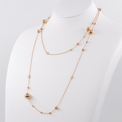 Sautoir en or rose serti de diamants et boucle d'or rose de différentes tailles