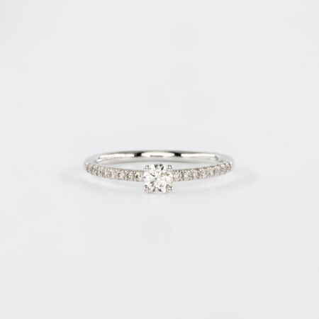 Solitaire diamant en or blanc centre 0.20ct & diamants sur le corps de bague