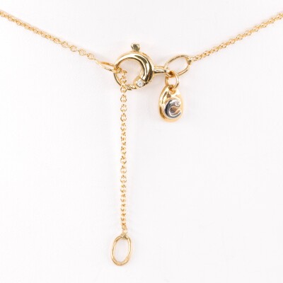 Pendentif sur chaine or jaune emeraude taille poire et diamants.