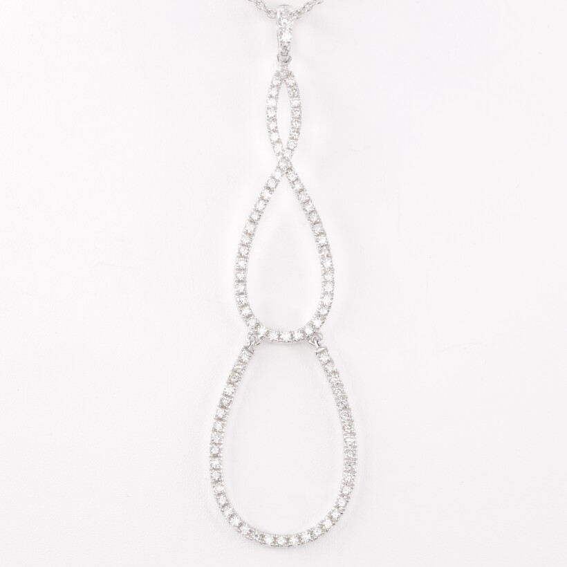 Pendentif or blanc articulé 3 gouttes entrelacées serties de diamants sur chaine en or blanc