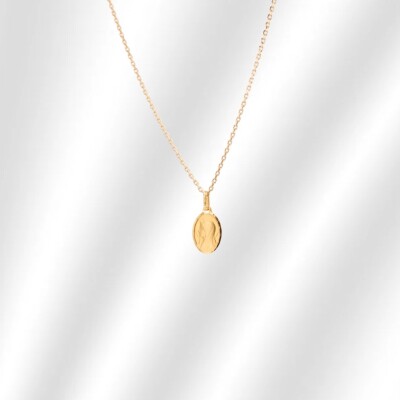 Médaille Vierge de Lourdes Collection Lumière en or jaune 750 millièmes.