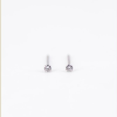 Boucles d'oreilles Collection Lumière or blanc 750 millièmes et oxydes de zirconium 2mm.