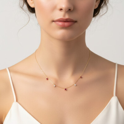 Collier or jaune 18 cts, rubis et diamants