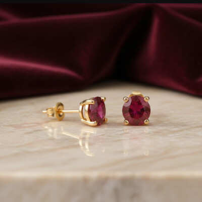 Boucles oreilles or jaun 18 cts et rubis