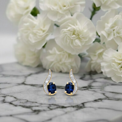 Boucles d'oreilles en or jaune, saphir et diamants