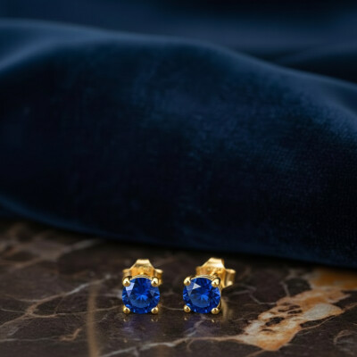 Boucles d'oreilles en or jaune et saphir