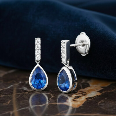 Boucles d'oreilles en or blanc, saphirs et diamant