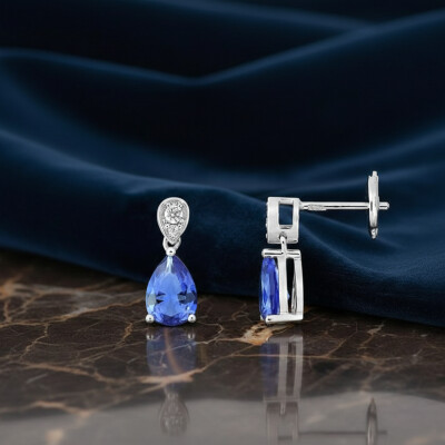 Boucles d'oreilles en or blanc, saphir et diamant