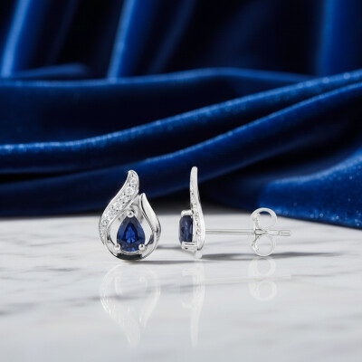 Boucles d'oreilles en or blanc, diamants et saphirs