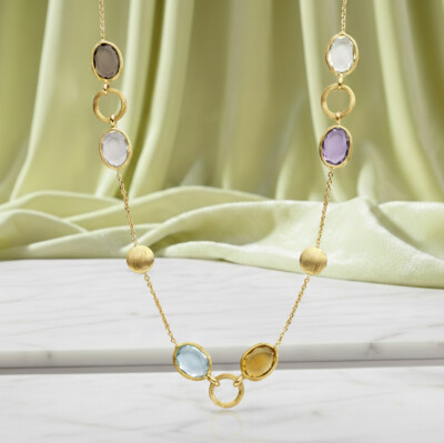 Collier or jaune et pierres fines