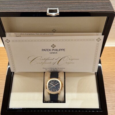 Patek Philippe Aquanaut Travel Time – Réf. 5269R-001 – Or Rose – Cadran Bleu – Bracelet Caoutchouc – Full Set