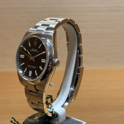 Rolex Oyster Perpetual 41 – Réf. 124300 – Acier – Cadran Noir – Lunette Lisse – Full Set -2024