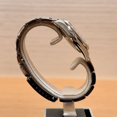 Rolex Oyster Perpetual 77080 – Acier – Cadran argenté – 31 mm