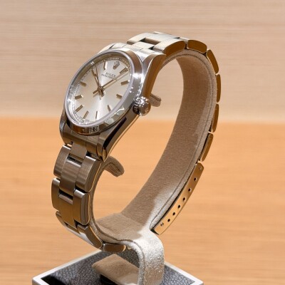 Rolex Oyster Perpetual 77080 – Acier – Cadran argenté – 31 mm