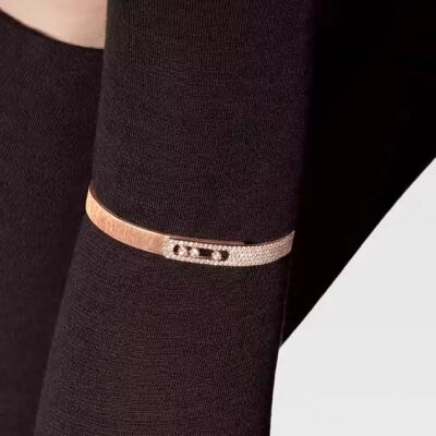 Bracelet bangle Messika Move Noa ciselé semi pavé en or rose et diamants