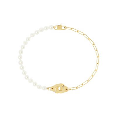 Bracelet Dinh Van de perles Menottes dinh van XS en or jaune et perle d'eau douce