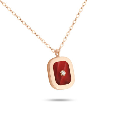 Collier Clozeau en or rose, résine rouge et diamant