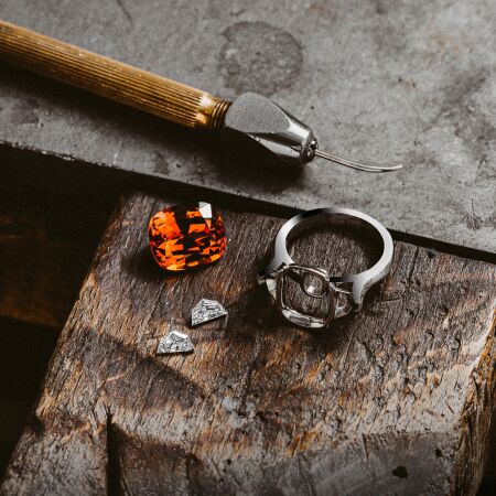 Three Stone Cushion Mandarin Garnet and Diamonds Ring