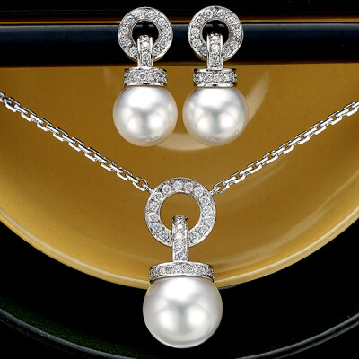 Pearl and Diamond earrings and pendant set