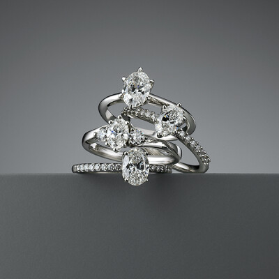 Oval and round brilliant cut Diamond rings