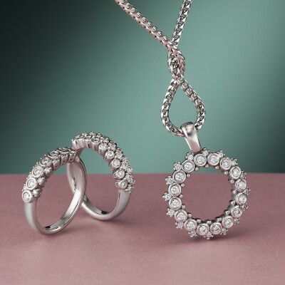 Diamond dress rings and circle of life pendant