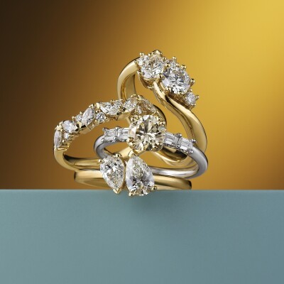 Pear-shaped, round and marquise Diamond rings