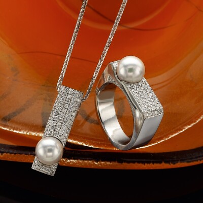 Pearl and Diamond ring and pendant set